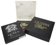 Music Memorabilia: An autographed album cover from a copy of Queen : The Complete Work