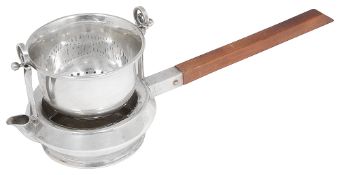 Asprey. An Edwardian silver tea strainer