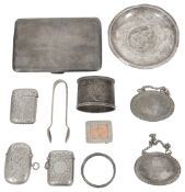 A large George VI engine turned silver cigarette case, Russian napkin ring and other items