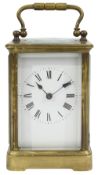 A French gilt brass striking carriage clock