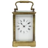 A French gilt brass striking carriage clock