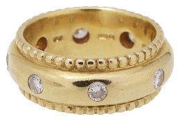 An 18ct yellow gold diamond-set ring by Theo Fennell