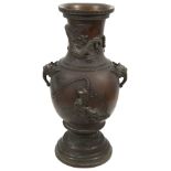 A Chinese patinated bronze two handled vase,