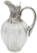 A late Victorian silver mounted glass claret jug