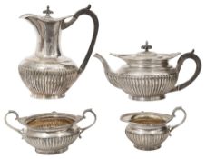 An Edwardian silver four piece tea service in George III style