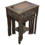 A Chinese carved rosewood nest of four occasional tables c.1930