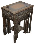 A Chinese carved rosewood nest of four occasional tables c.1930