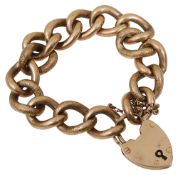 A 9ct curb link bracelet with heart locket