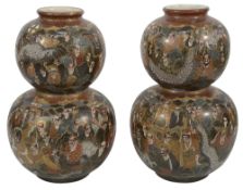 A pair of late 19th century Japanese satsuma double gourd vases
