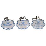A set of three 18th century French enamel wine labels (3)