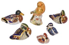 A collection of five Royal Crown Derby paperweights of ducks etc