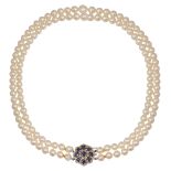 A two row cultured pearl necklace with gem-set cluster clasp