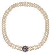 A two row cultured pearl necklace with gem-set cluster clasp