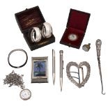 A late Victorian silver heart shaped buckle and other vertu