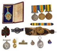A WWI four medal group awarded to 925758 DVR E.G. Henley, other medals badges