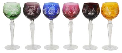 An early 20th century Bohemian harlequin set of six flashed cut crystal hock glasses