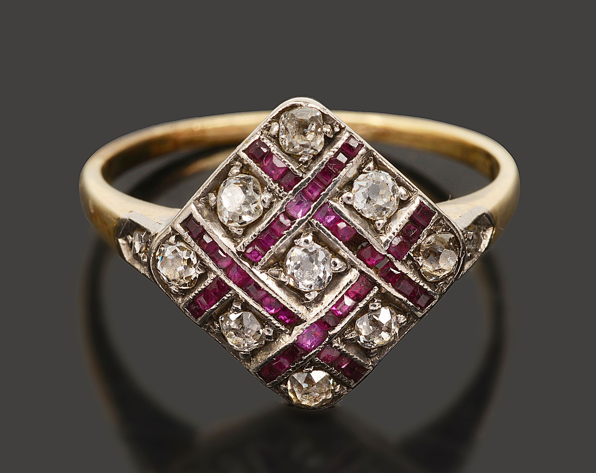 A diamond and ruby-set chequer board ring