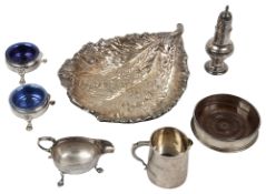 A collection of George II George III and later silver to include a pair of salts,a bottle coaster, a