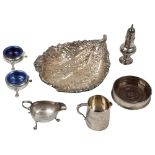 A collection of George II George III and later silver to include a pair of salts,a bottle coaster, a