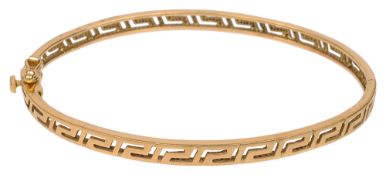 A Greek key oval hinged bangle