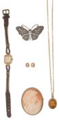Small collection of jewellery including; Cameo brooch, amber pendant on chain, pair of cameo earring