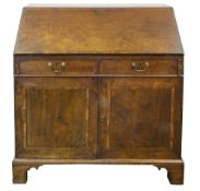 A George III figured mahogany bureau