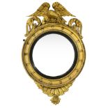 A Regency giltwood and gesso convex wall mirror