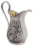 An Arts & Crafts silver cream jug