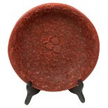 A Chinese cinnabar lacquer charger