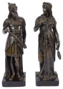 A pair of late 19th century French Assyrian Revival patinated bronze figures of a king and queen in