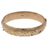 A 9ct gold stiff bangle