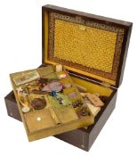 An early Victorian rosewood and mother of pearl inlaid sewing box and contents