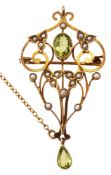 An Edwardian 9ct gold peridot and seed pearl brooch