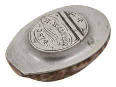 A small 19th century silver mounted cowrie shell snuff box