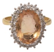 A topaz and diamond-set cluster ring