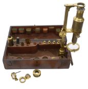 An early 19th century brass chest monocular microscope