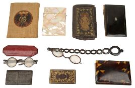 A Victorian tortoiseshell and pique inlaid card case, a mother of pearl veneered card case, other le