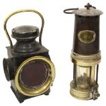 An early 20th century Powell & Hanmer RAF automobile lamp and a Patterson & Co Type A3 Miners lamp