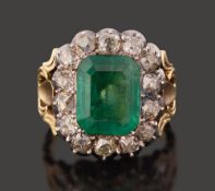 A 19th century emerald and diamond-set cluster ring