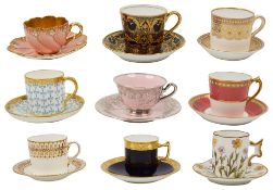 A collection of nine demi tasse coffee cups and saucers