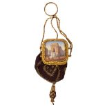 A mid 19th century French Palais Royal gilt metal purse with vinaigrette