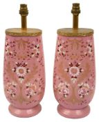 A pair of 19th century French pink opaline glass vases, converted to lamps