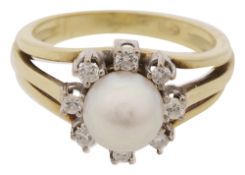 A cultured pearl and diamond set ring