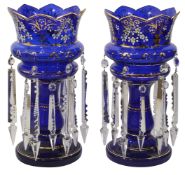 A pair of Victorian blue glass lustre vases