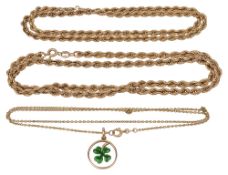 An enamelled 15ct gold shamrock pendant and chains