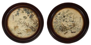 A pair of 19th century Chinese embroidered roundels,