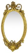 A Victorian giltwood and gesso oval girandole mirror