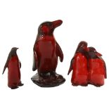 A Royal Doulton Peruvian penguin together with two further penguins