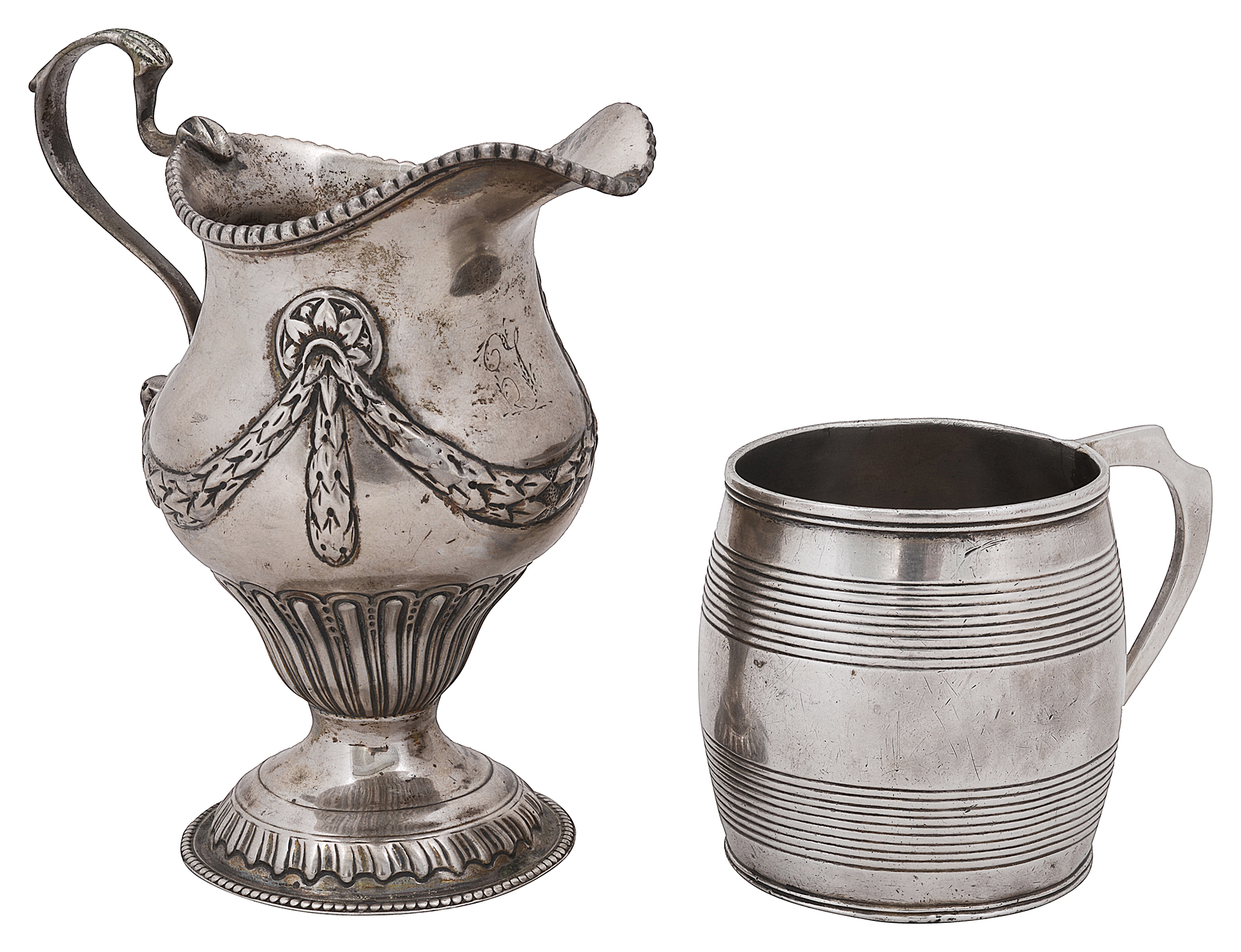 A George III ogee baluster cream jug and christening mug