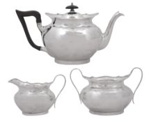 An Edwardian silver three piece tea service